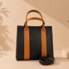 WhatsApp Image 2026-05-16 at 22.34.58 Ziffly "Aura" Two-Tone Executive Tote – Structured 11-Inch Black & Tan Professional Handbag*