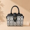 white blck bag Black and white monogram pattern structured handbag for women with black faux leather top handles and gold hardware