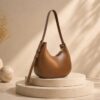 WhatsApp Image 2026-05-18 at 15.25.34 Minimalist Crescent Hobo Shoulder Bag for Women – Adjustable Strap Slouchy Handbag